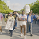 Dan Marino (left, striped shirt) and several Miami Dolphins players and their supporters out picketing. (Raul Demolina/AP Photo)